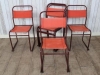 red frame stacking chairs