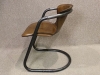 industrial style tubular metal and leather chair