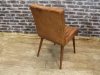 aged tan leather kitchen chair