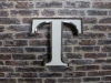 decorative letter t wall sign