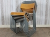 painted industrial stacking chairs